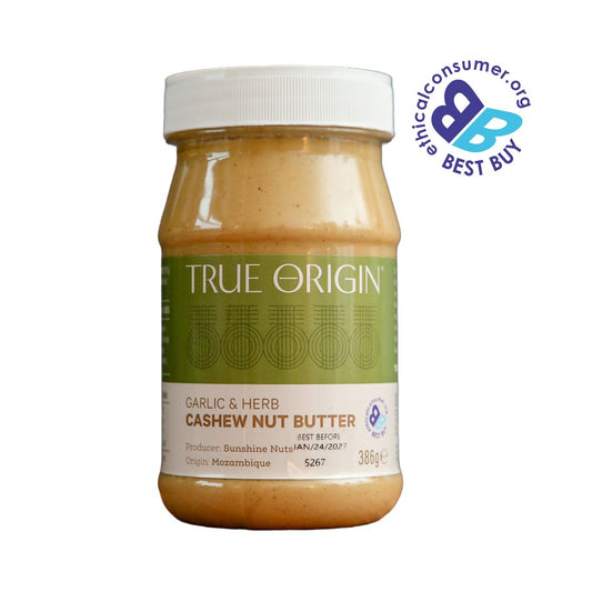Jar of True Origin garlic & herb cashew nut butter with a 'Best Buy' label on a white background from Mozambique.